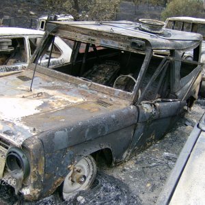 Burned bronco and other vehicles